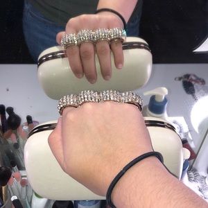 Stylish knuckle ring purse / clutch